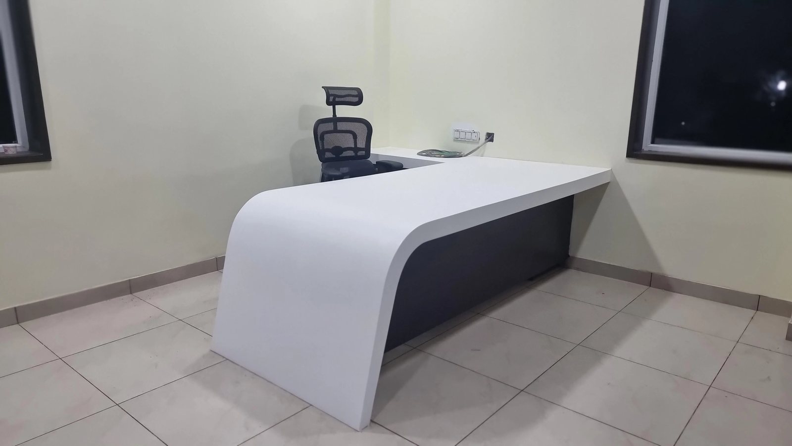 Curved Reception Desk interior project in Coimbatore by AVS Interior Design